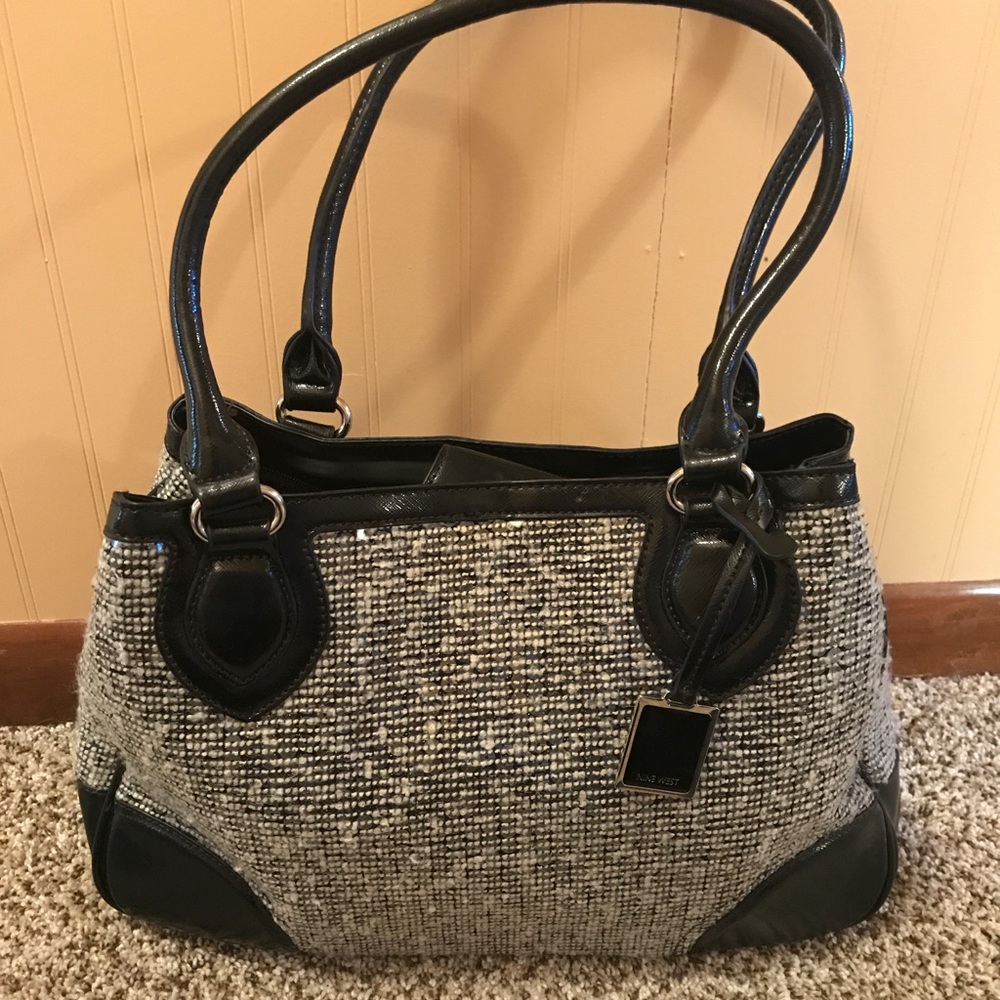 Silver and black handbag